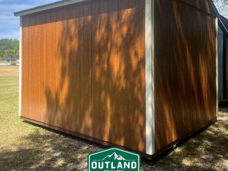 Outland Trailers 10x12 utility shed with durable metal construction, featuring a spacious design for storage and outdoor equipment.