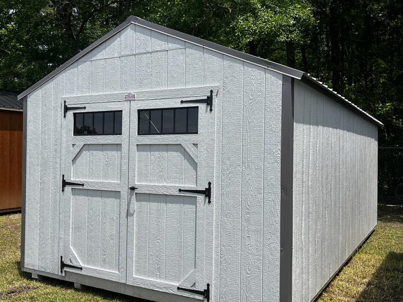 Outland Trailers 12x20 utility shed shown outdoors with double doors and durable metal construction.