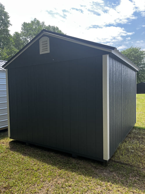 Outland Trailers 10x12 utility shed with double doors and metal roof, ideal for storage and outdoor organization