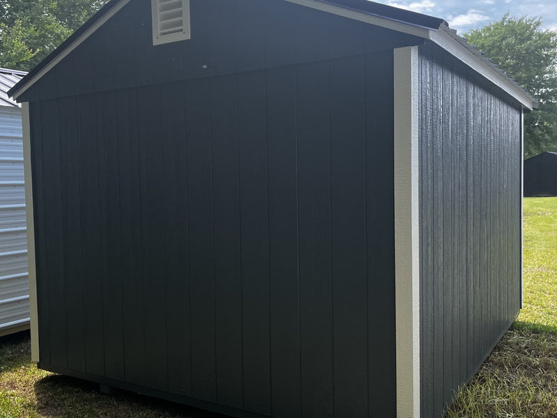 Outland Trailers 10x12 utility shed with double doors and metal roof, ideal for storage and outdoor organization