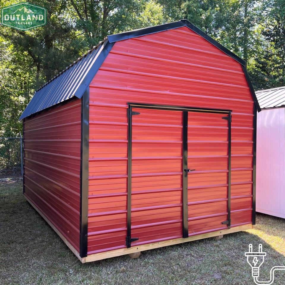 Metal lofted barn shed by Outland Trailers featuring a sturdy metal roof and elevated interior, ideal for storage or workshops.