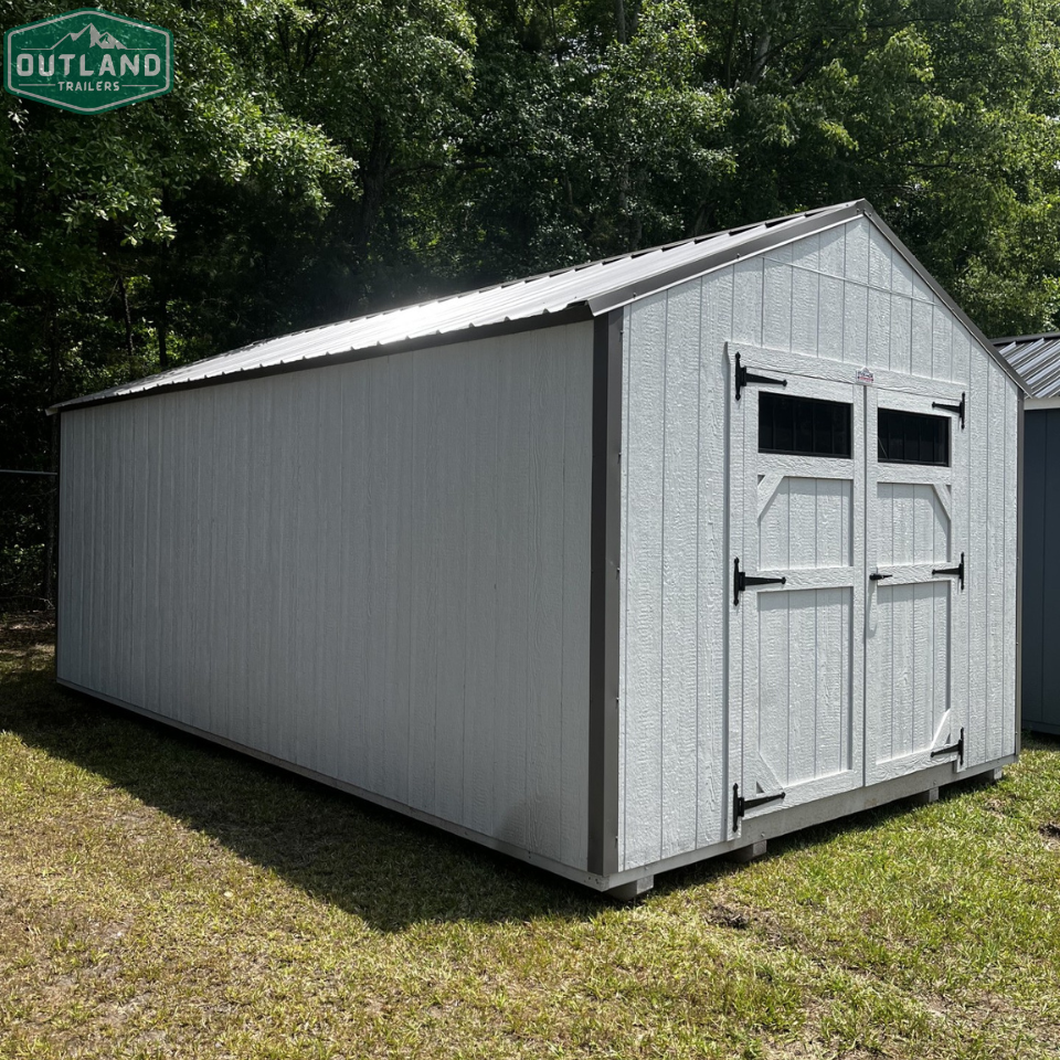 Outland Trailers 12x20 utility shed with double doors, durable metal construction, and ample storage space for tools and equipment.