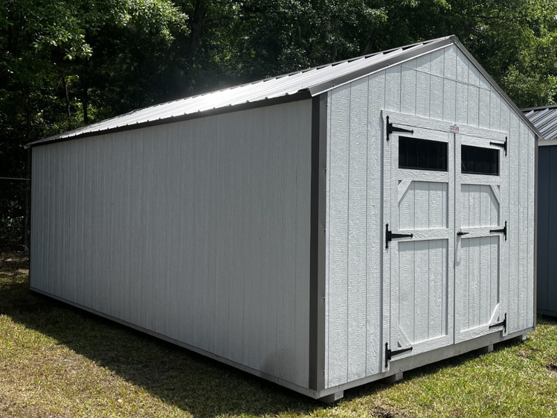 Outland Trailers 12x20 utility shed with double doors, durable metal construction, and ample storage space for tools and equipment.