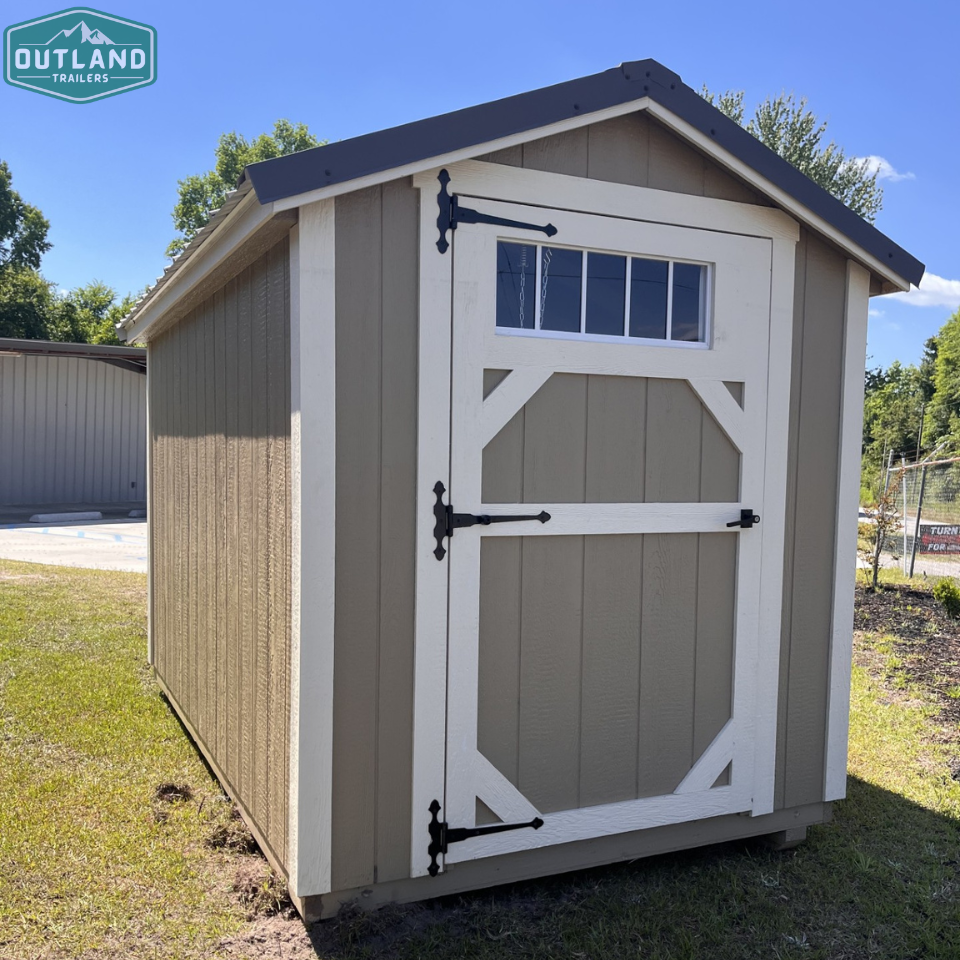 Outland Trailers 6x10 Metro Shed with sturdy metal construction, compact design, and secure door for versatile storage.