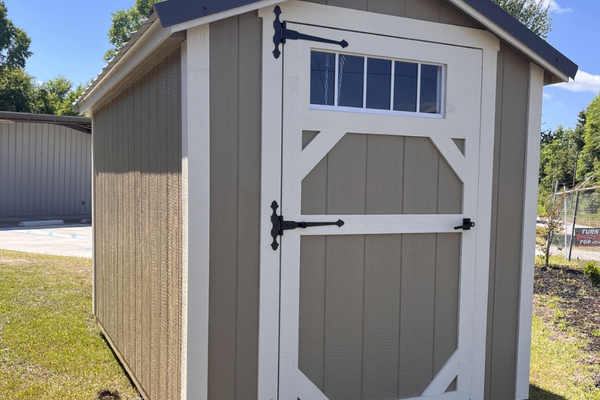 Outland Trailers 6x10 Metro Shed with sturdy metal construction, compact design, and secure door for versatile storage.