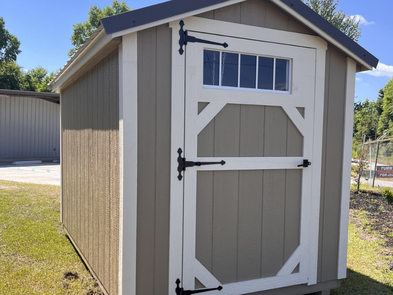 Outland Trailers 6x10 Metro Shed with sturdy metal construction, compact design, and secure door for versatile storage.