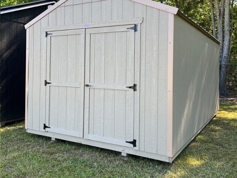 Outland Trailers 10x16 Tru-Valu utility shed with double doors and sturdy metal construction, ideal for storage and outdoor use.