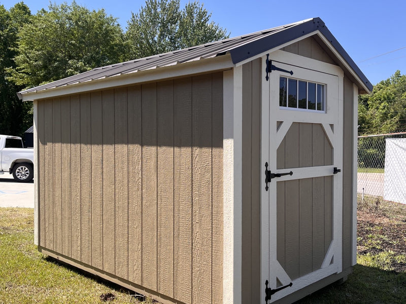 Outland Trailers 6x10 Metro Shed with metal construction, gray color, and double doors for secure outdoor storage.
